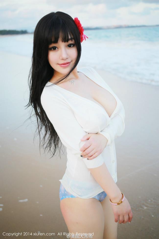 大胸美女可儿海边大秀巨乳性感写真(点击浏览下一张趣图)